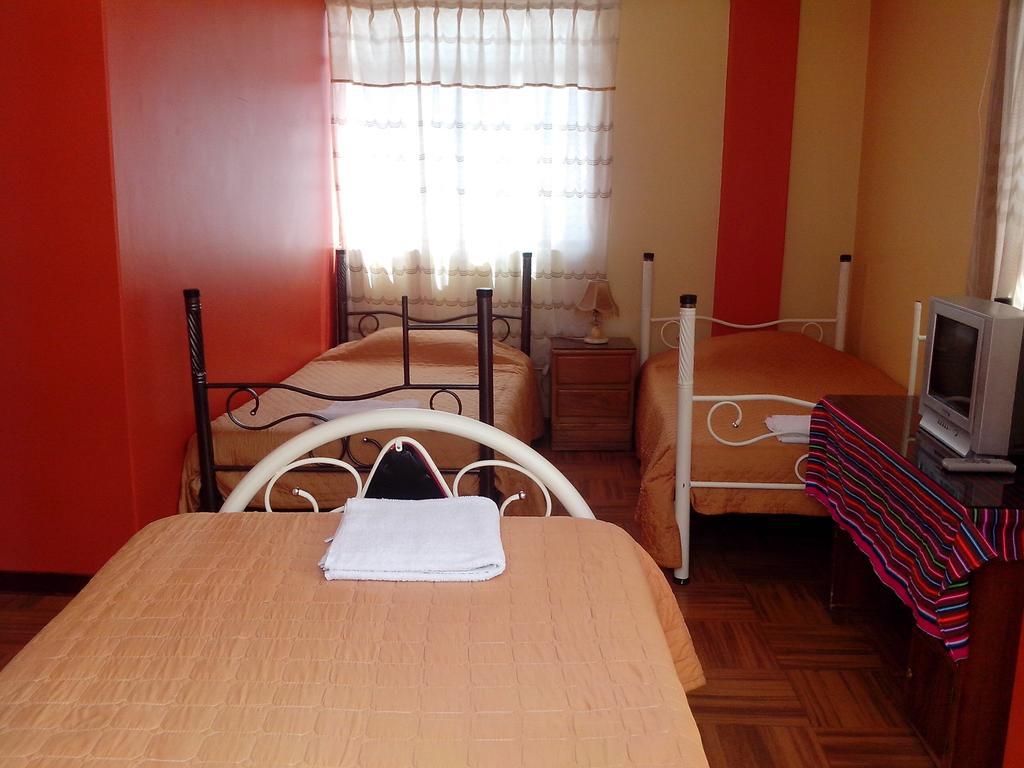 Totorani Inn Puno Zimmer foto